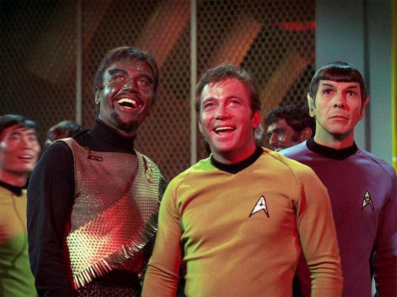 Kirk and Kang share a laugh.